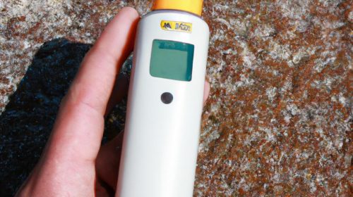 Person holding radon testing device
