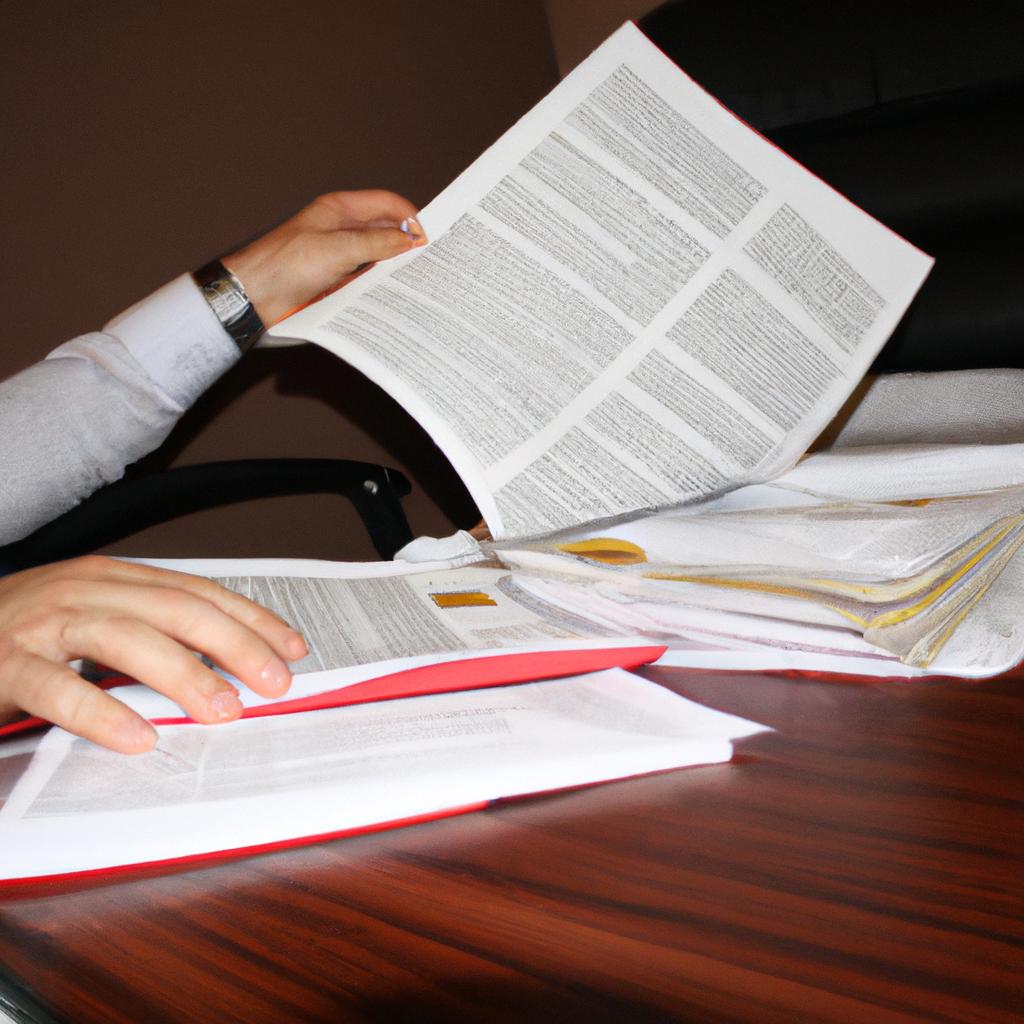 Person handling financial documents professionally